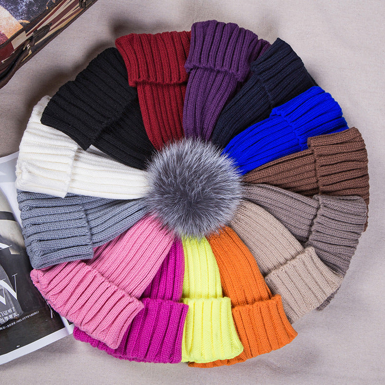 Wollmütze mit grossem Fuchspelzbommel